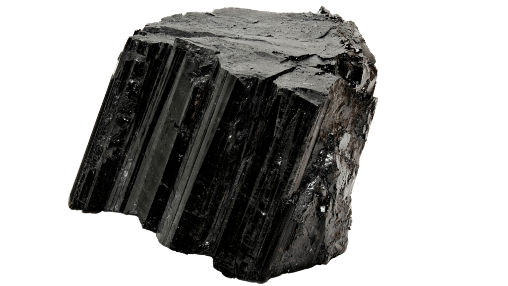 A large, rough black tourmaline crystal with vertical striations and jagged edges, perfect for those seeking to enhance their healing journey.