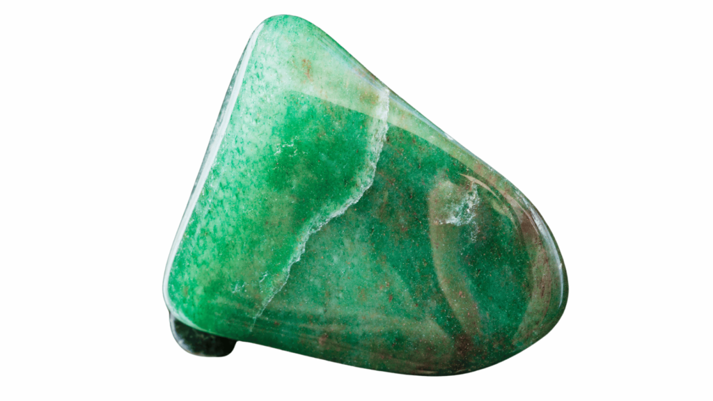 A smooth, polished green stone with natural white streaks, reminiscent of Reiki crystals, set against a solid purple background.